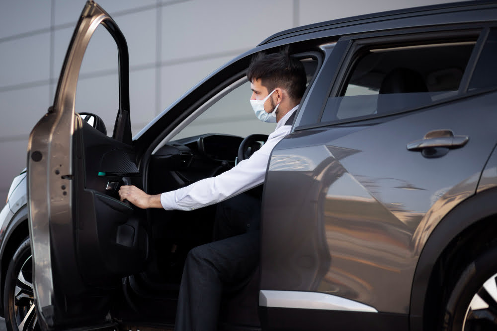 driver with opened car door