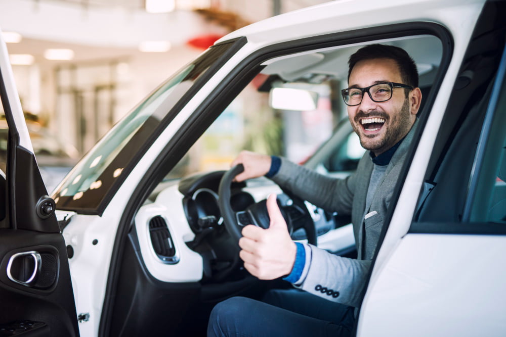 happy satisfied customer just bought brand new car vehicle dealership