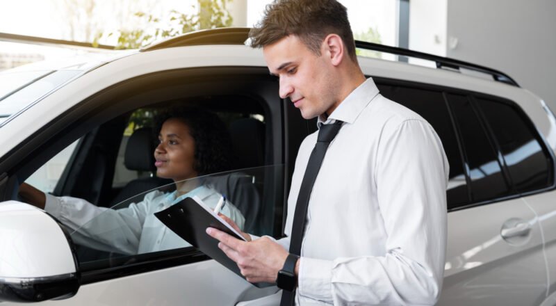 woman enjoying her financially independence while buying car